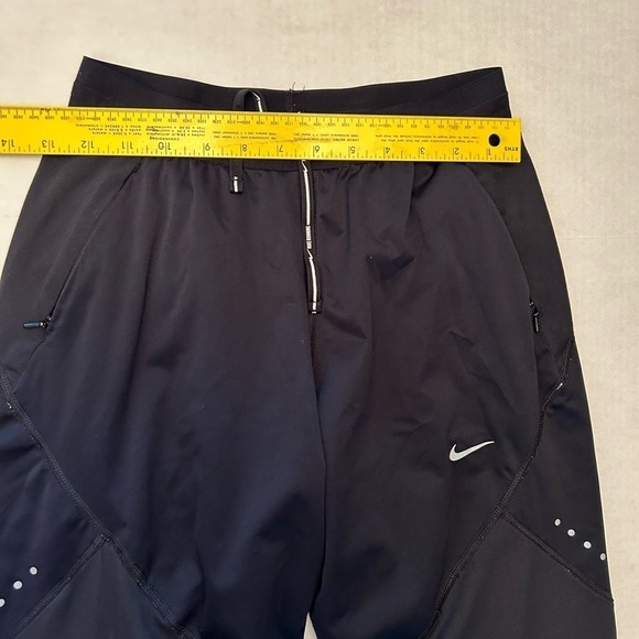 Nike women’s DriFit shield running jogger pants w/zip pockets & ankles Sz-XS X4 - Picture 12 of 12